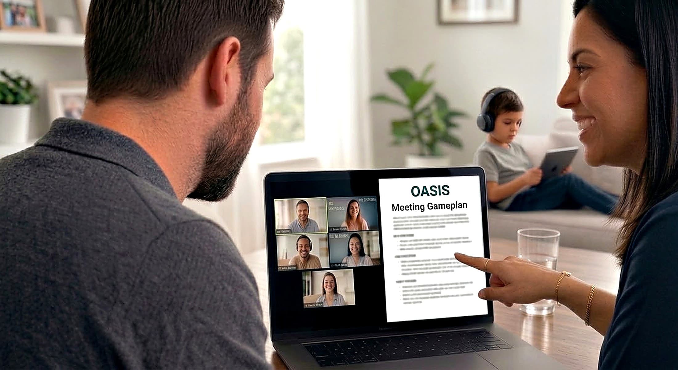 Two parents reviewing their meeting gameplan together on a laptop at home